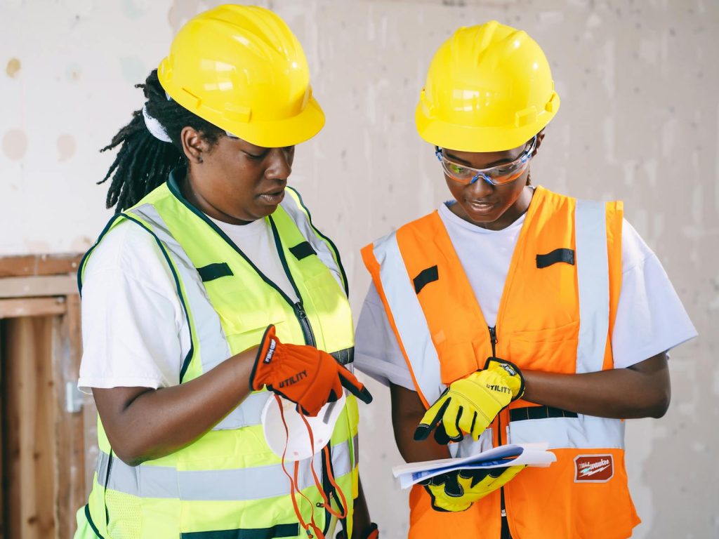 Engineers Looking on Documents